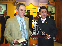 Kasparov with the Linares 2002 trophy